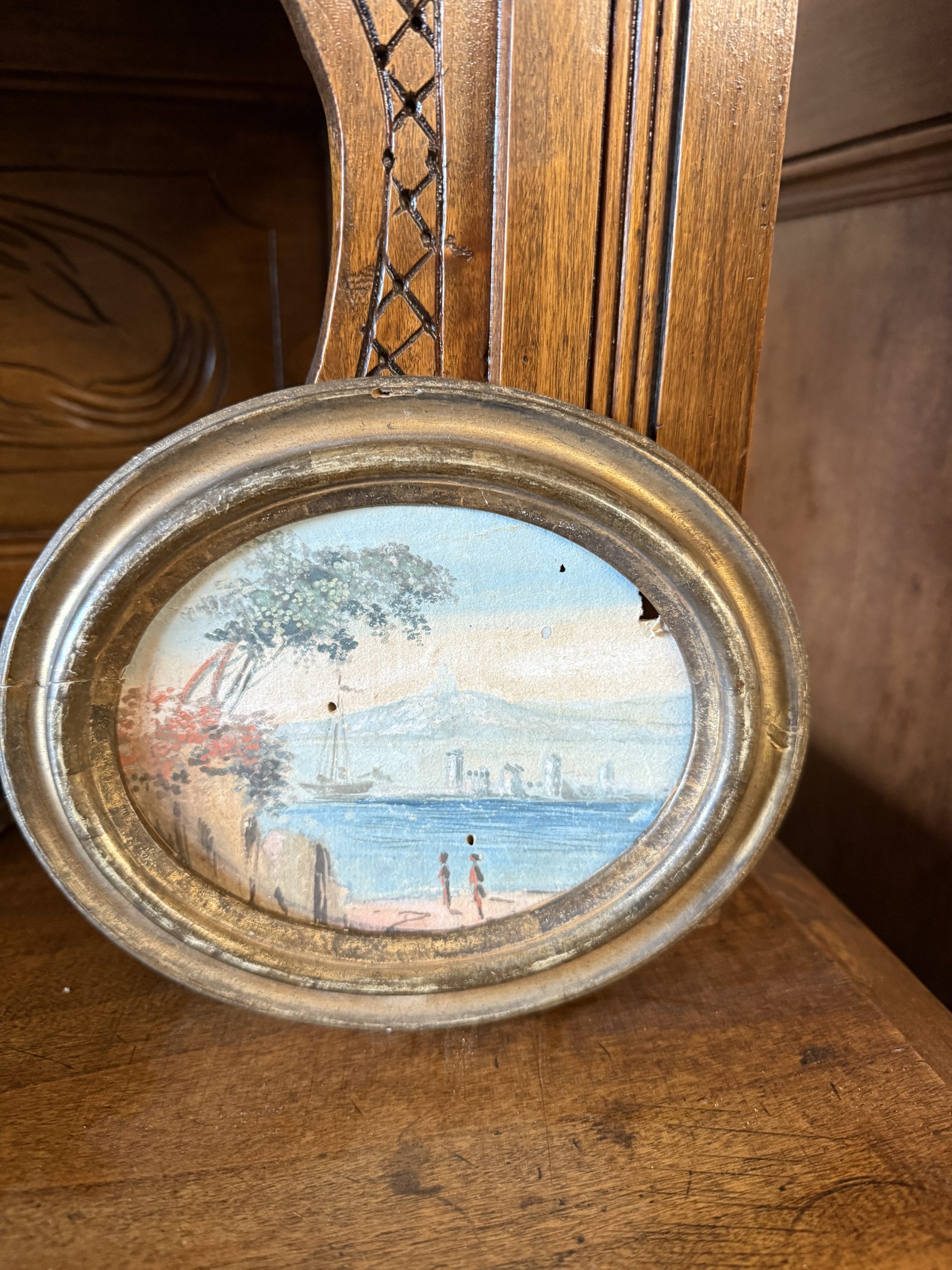 Antico dipinto su carta ovale raffigurante paesaggio marino XVII sec in cornice dorata 17x20cm